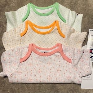 Set of three cute, comfy Tommy onesies.